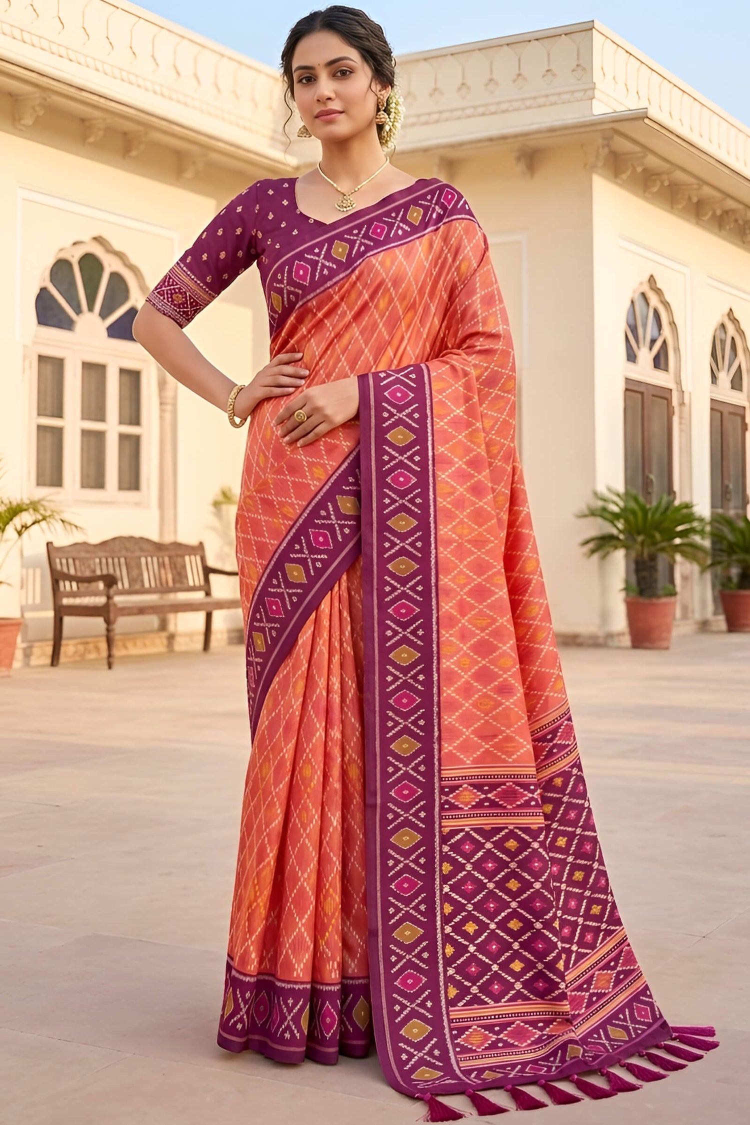 Glorious Orange Patola Silk Saree with Gleaming Blouse Piece