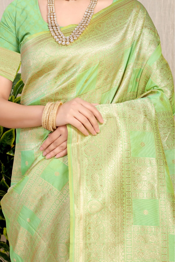 Outstanding Pista Kanjivaram Silk Saree With Glittering Blouse Piece