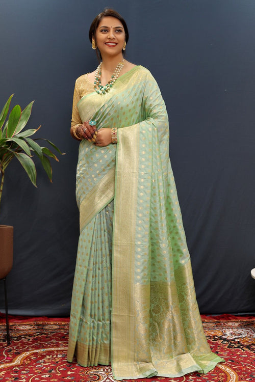 Load image into Gallery viewer, Snazzy Pista Soft Banarasi Silk Saree With Confounding Blouse Piece
