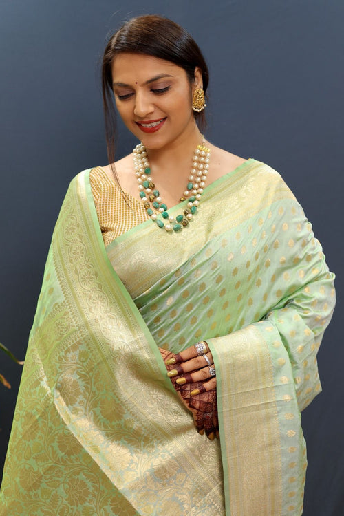 Load image into Gallery viewer, Snazzy Pista Soft Banarasi Silk Saree With Confounding Blouse Piece
