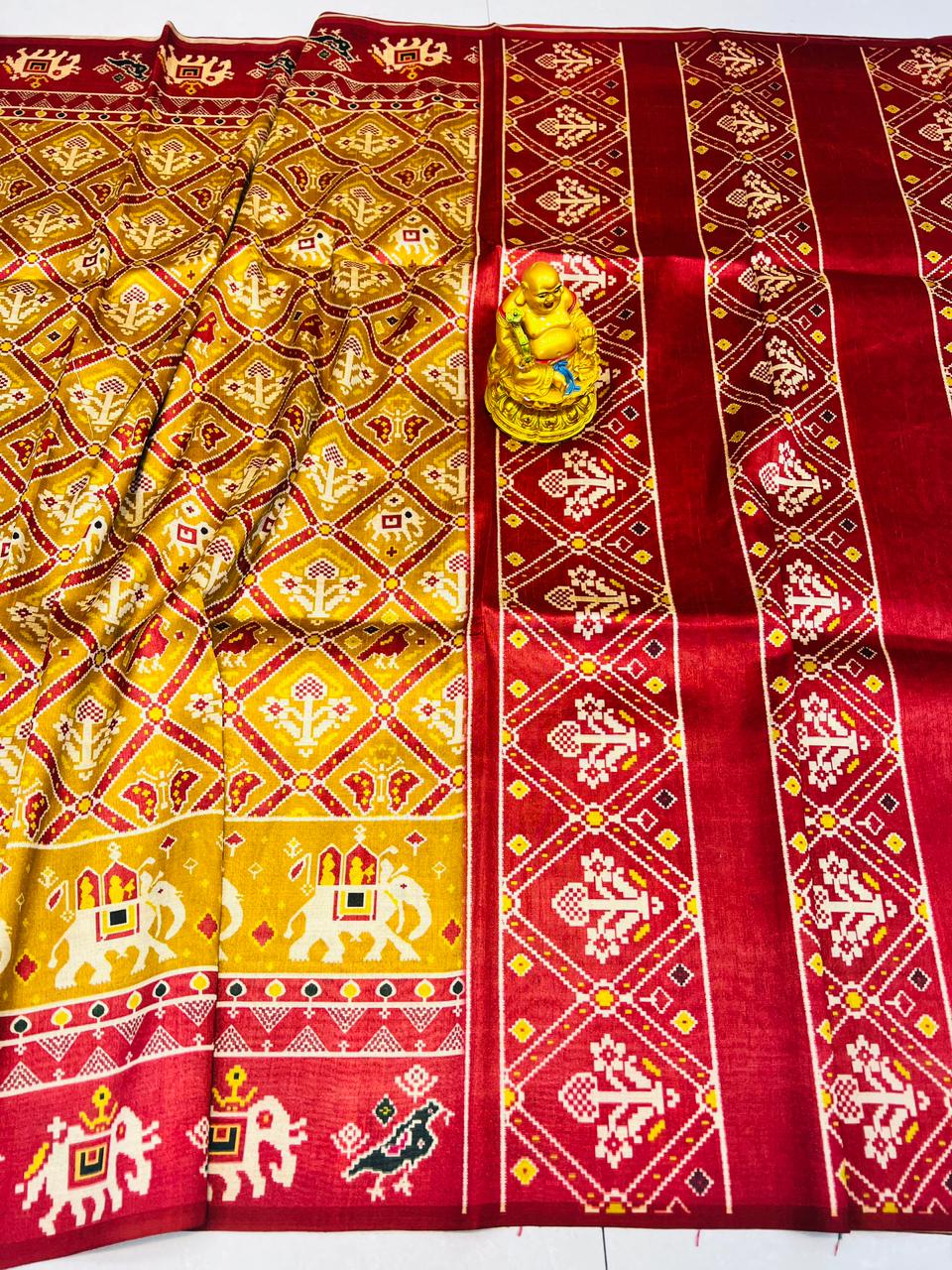 Beleaguer Yellow Patola Silk Saree with Moiety Blouse Piece