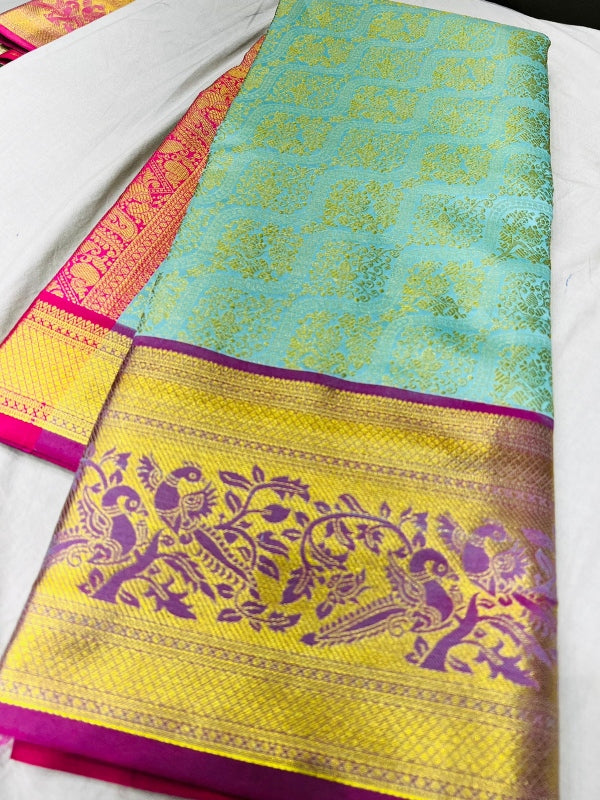 Sizzling Sky Soft Banarasi Silk Saree With Impressive Blouse Piece