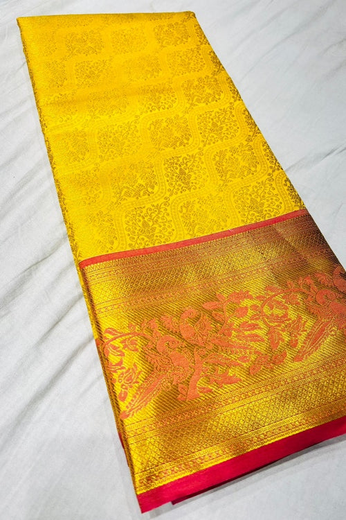 Load image into Gallery viewer, Gorgeous Yellow Soft Banarasi Silk Saree With Impressive Blouse Piece
