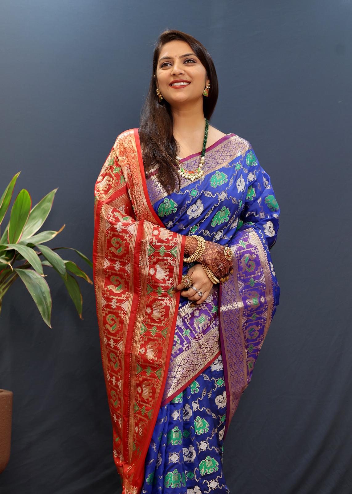 Beleaguer Blue Patola Silk Saree with Exemplary Blouse Piece