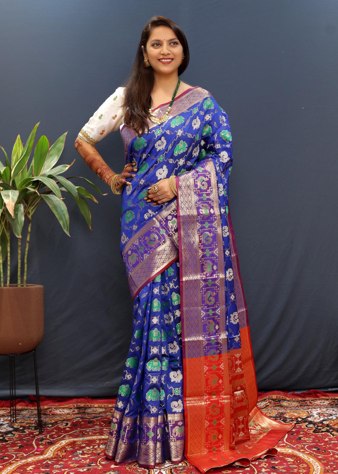 Beleaguer Blue Patola Silk Saree with Exemplary Blouse Piece