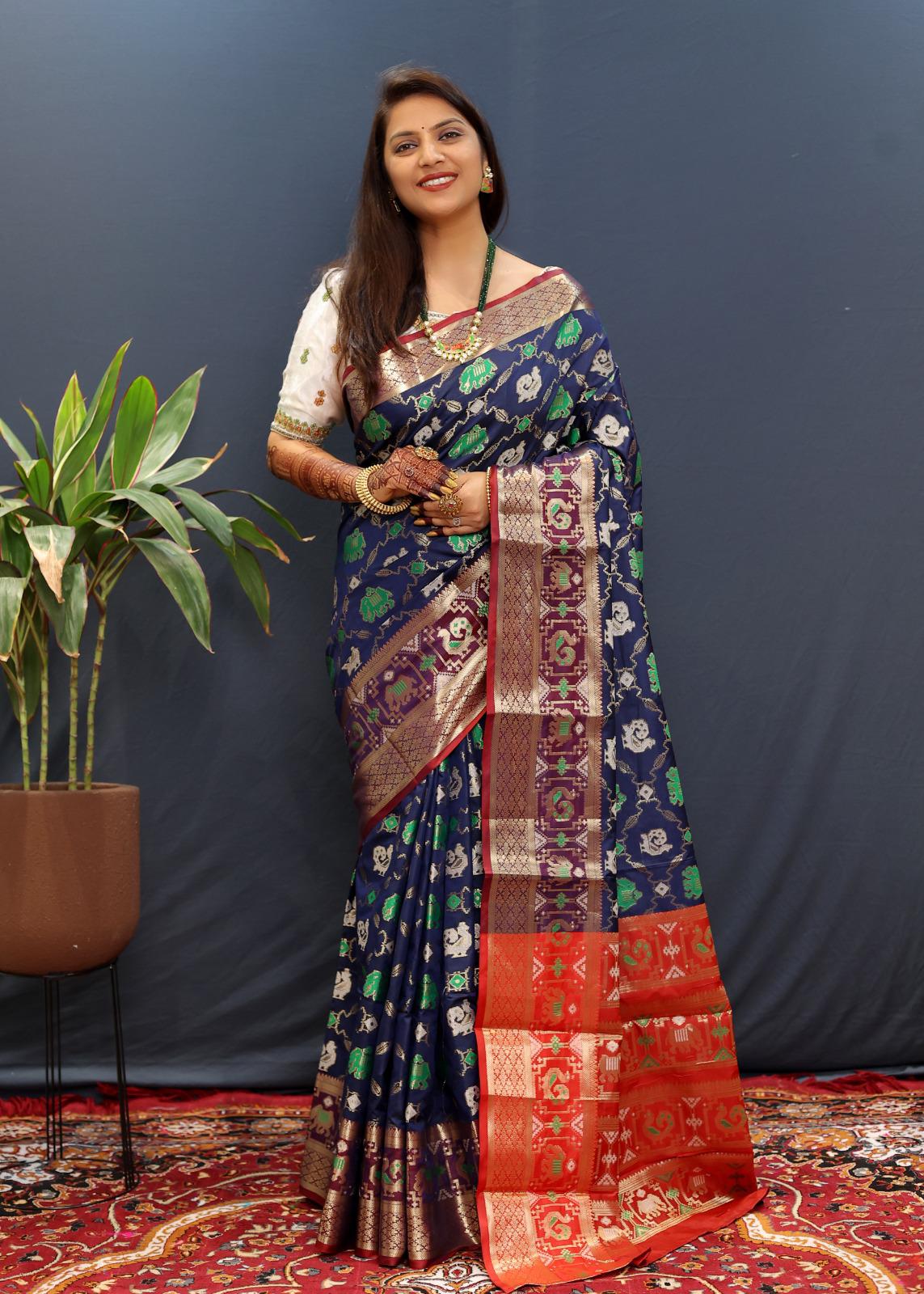 Woebegone Navy Blue Patola Silk Saree with Quixotic Blouse Piece