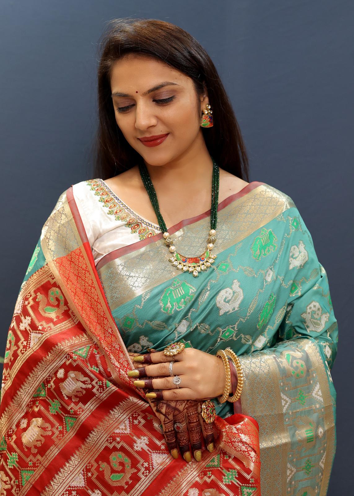 Susurrous Sky Patola Silk Saree with Dulcet Blouse Piece