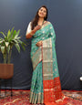 Susurrous Sky Patola Silk Saree with Dulcet Blouse Piece