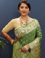 Enticing Green Soft Banarasi Silk Saree With Dissemble Blouse Piece