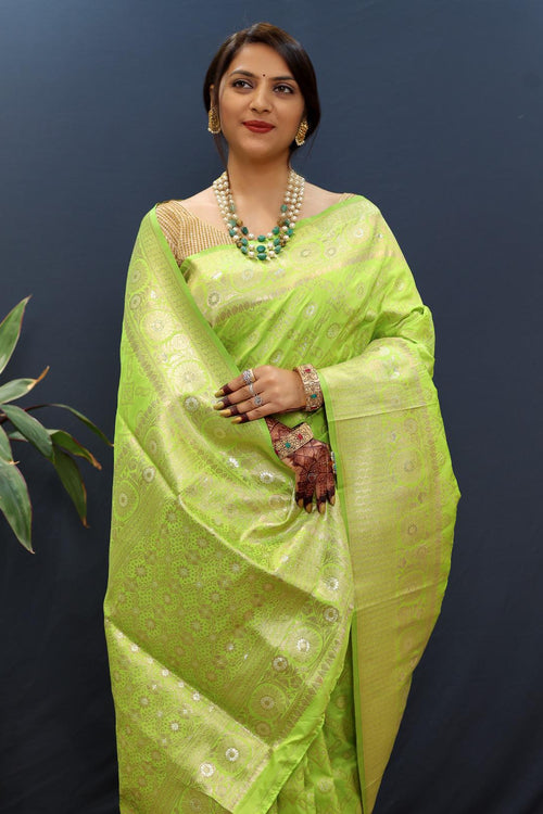 Load image into Gallery viewer, Evocative Parrot Soft Banarasi Silk Saree With Mellifluous Blouse Piece
