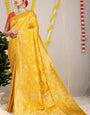 Demanding Yellow Soft Banarasi Silk Saree With Nemesis Blouse Piece