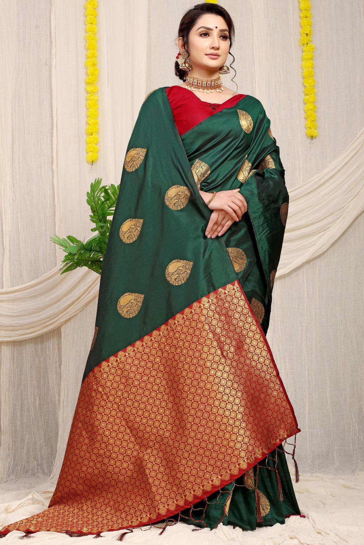 Unique Dark Green Banarasi Silk Saree With Engrossing Blouse Piece