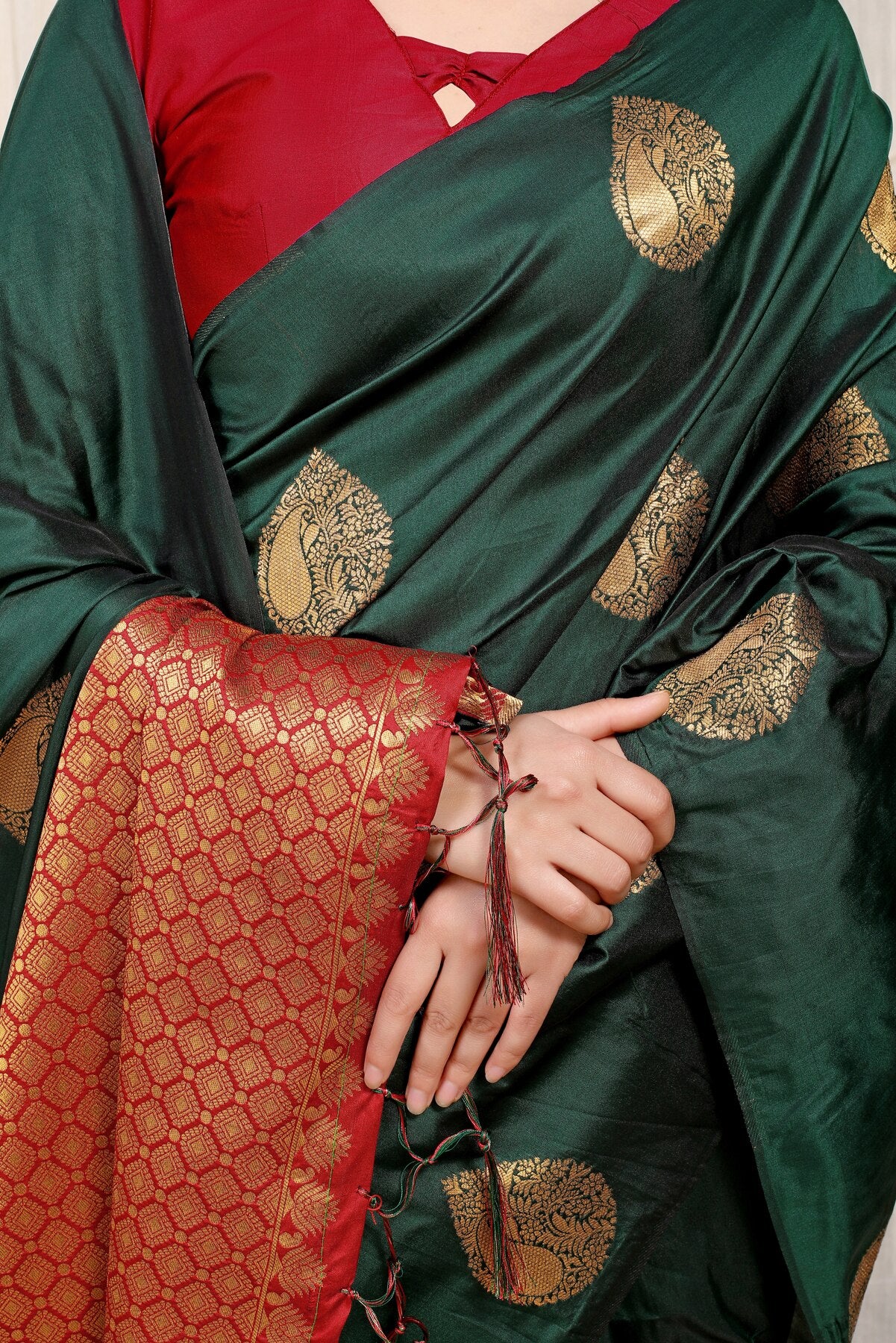 Unique Dark Green Banarasi Silk Saree With Engrossing Blouse Piece