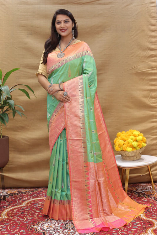 Load image into Gallery viewer, Charming Sea Green Soft Banarasi Silk Saree With Surpassing Blouse Piece
