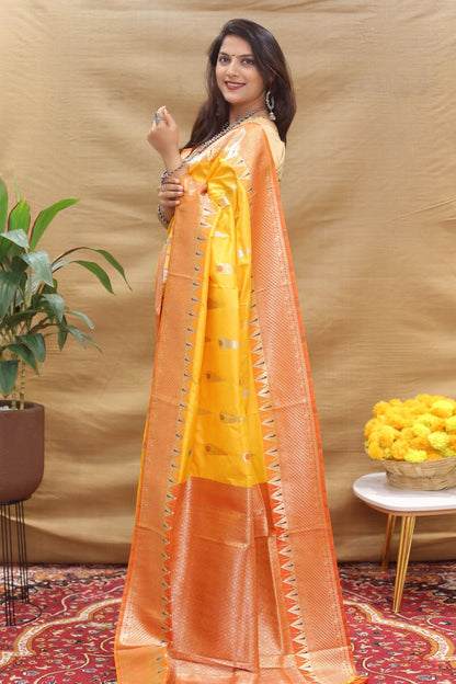 Ethnic Yellow Soft Banarasi Silk Saree With Exceptional Blouse Piece
