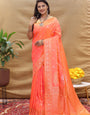 Cynosure Peach Soft Banarasi Silk Saree With Evocative Blouse Piece