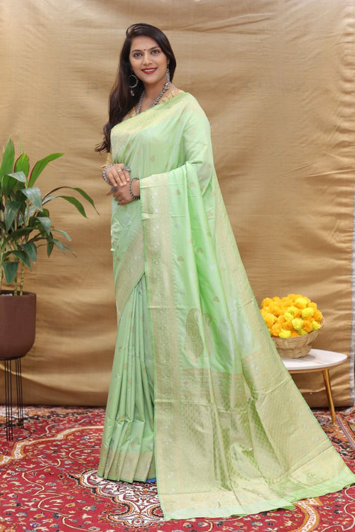 Load image into Gallery viewer, Snazzy Pista Soft Banarasi Silk Saree With Profuse Blouse Piece
