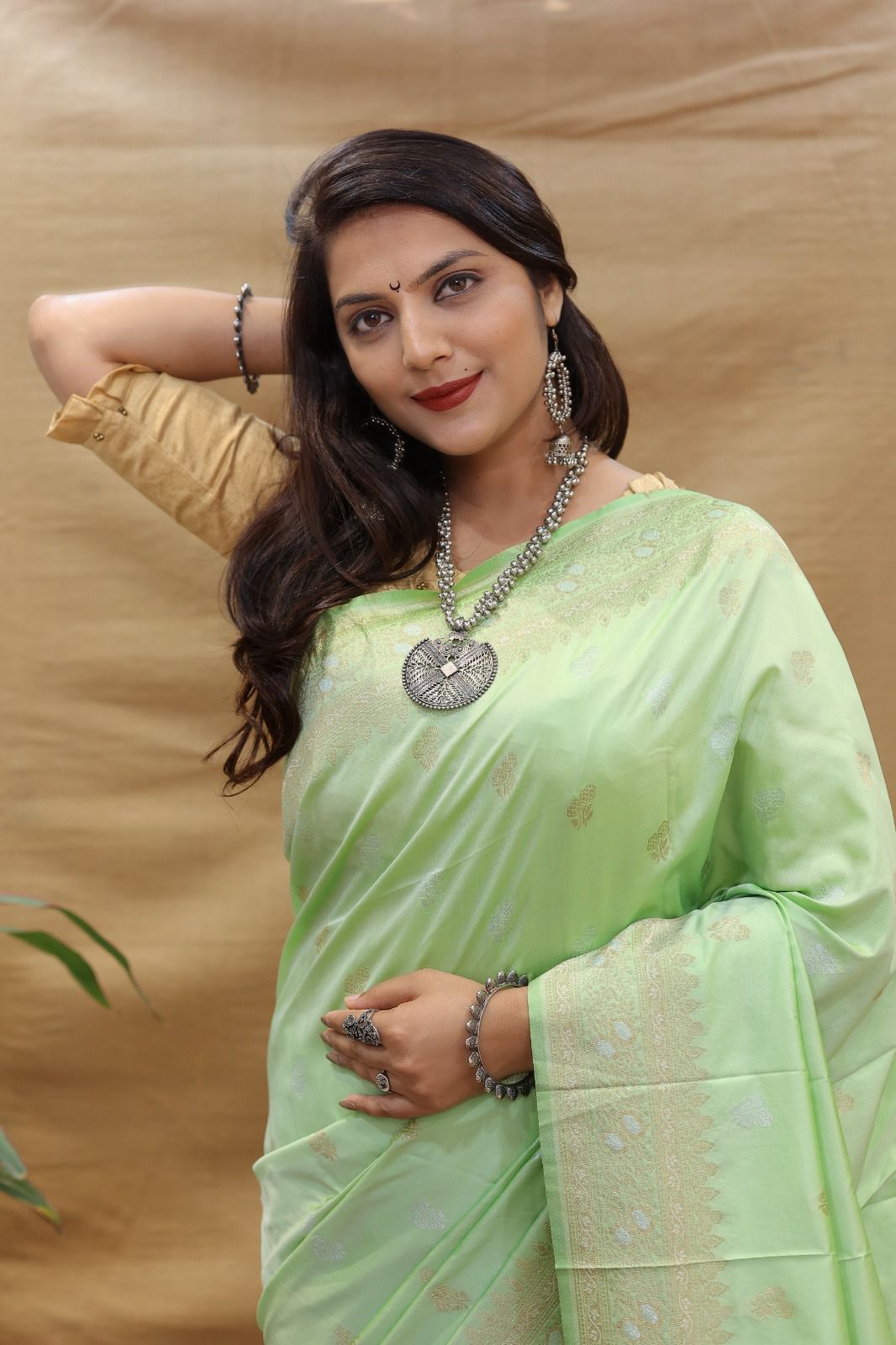 Snazzy Pista Soft Banarasi Silk Saree With Profuse Blouse Piece