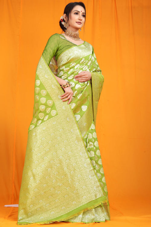 Load image into Gallery viewer, Staring Green Banarasi Silk Saree With Divine Blouse Piece
