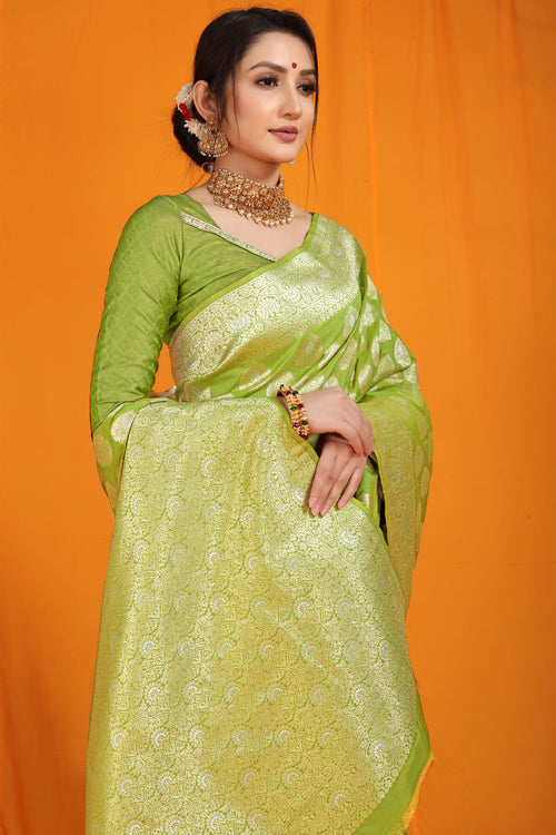 Load image into Gallery viewer, Staring Green Banarasi Silk Saree With Divine Blouse Piece
