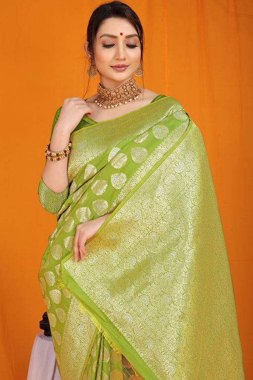 Load image into Gallery viewer, Staring Green Banarasi Silk Saree With Divine Blouse Piece
