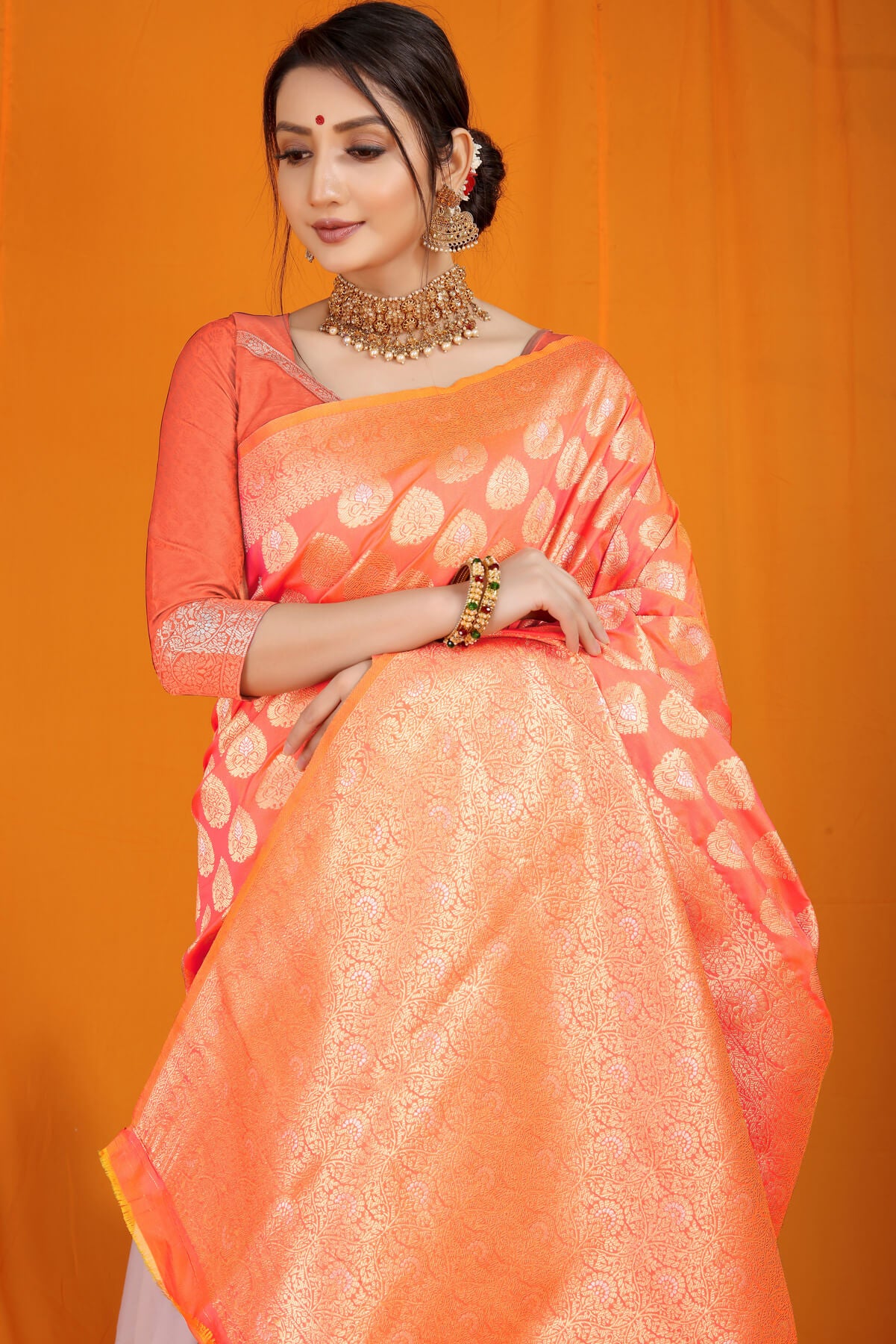 Eye-catching Peach Banarasi Silk Saree With Divine Blouse Piece