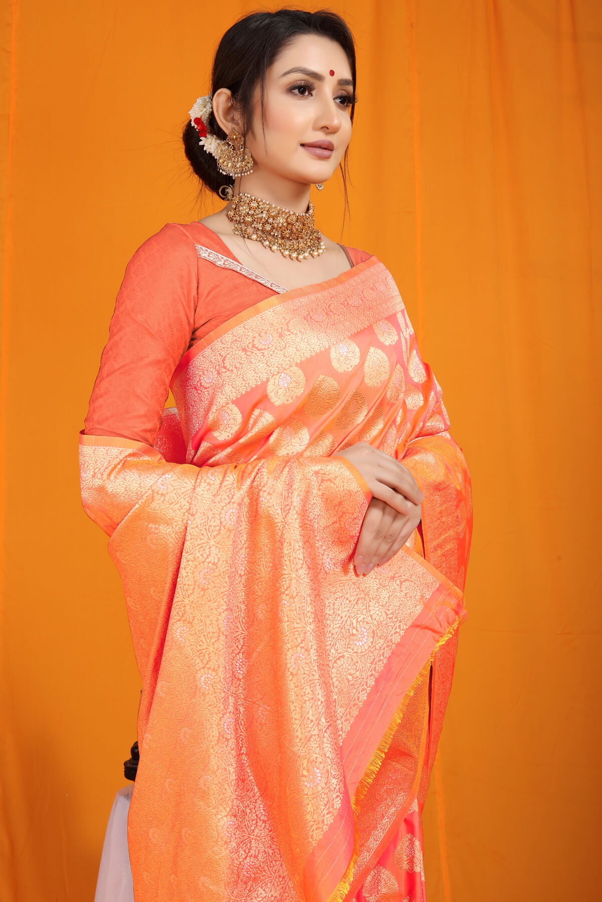 Eye-catching Peach Banarasi Silk Saree With Divine Blouse Piece