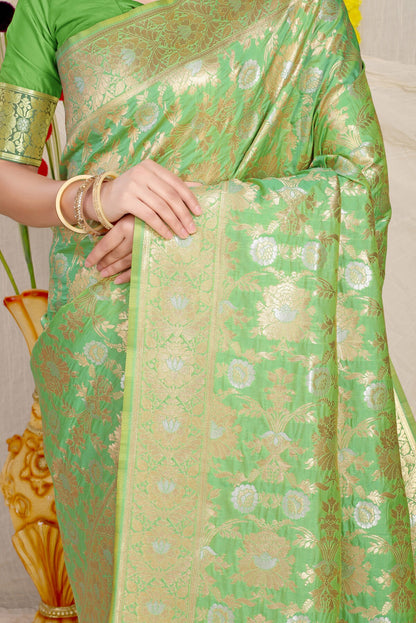 Sensational Green Banarasi Silk Saree With Fairytale Blouse Piece
