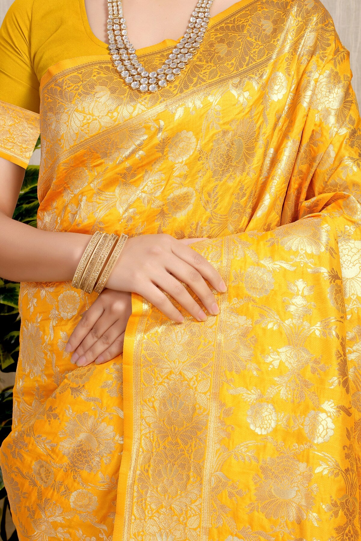 Prominent Yellow Banarasi Silk Saree With Fairytale Blouse Piece