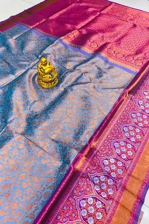 Load image into Gallery viewer, Luxuriant Sky Kanjivaram Silk Saree With Gratifying Blouse Piece
