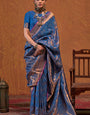 Dazzling Navy Blue Kanjivaram Silk Saree With Deserving Blouse Piece