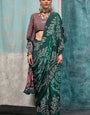 Enticing Dark Green Digital Printed Crape Silk Saree With Diaphanous Blouse Piece