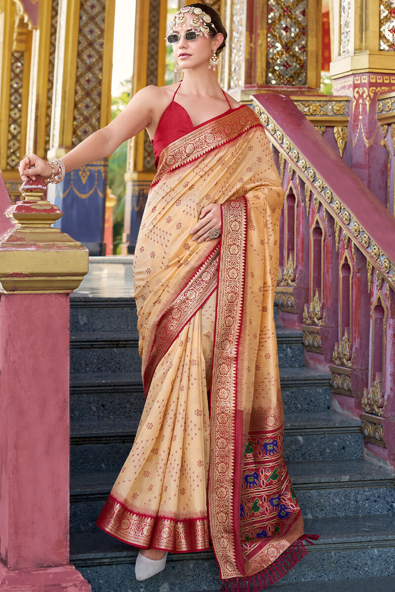 Surreptitious Beige Patola Silk Saree with Petrichor Blouse Piece