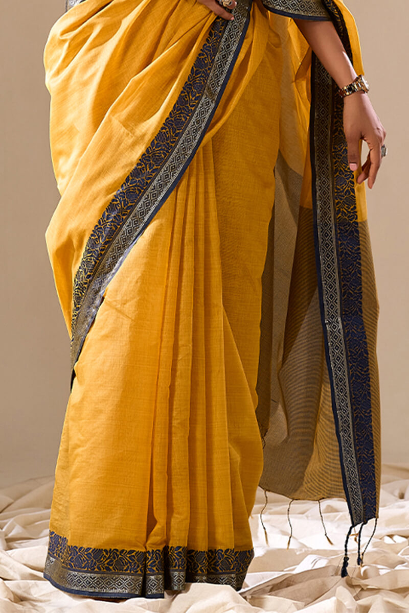 Energetic Yellow Cotton Silk Saree With Attractive Blouse Piece