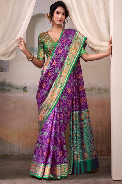 Engrossing Purple Patola Silk Saree With Fairytale Blouse Piece