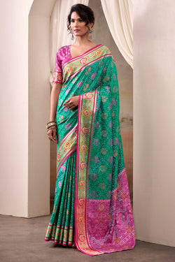 Radiant Rama Patola Silk Saree With Effulgent Blouse Piece