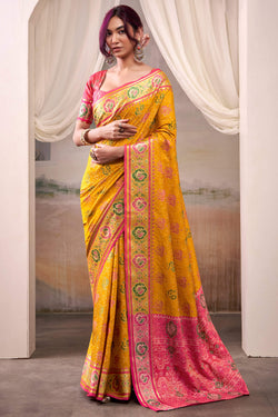 Lustrous Yellow Patola Silk Saree With Desirable Blouse Piece