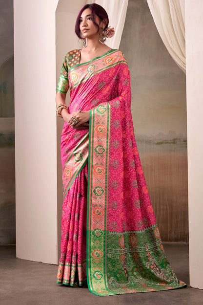 Amiable Pink Patola Silk Saree With Flamboyant Blouse Piece