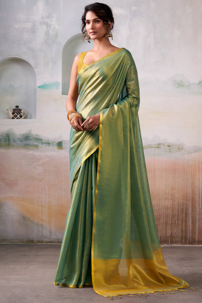 Fantabulous Green Soft Banarasi Tissue Silk Saree With Skinny Blouse Piece