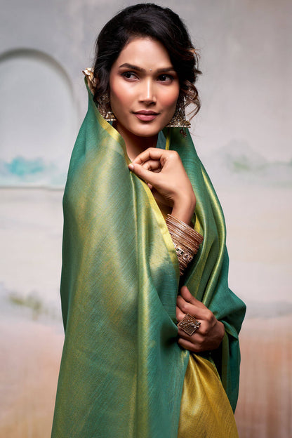 Fantabulous Green Soft Banarasi Tissue Silk Saree With Skinny Blouse Piece