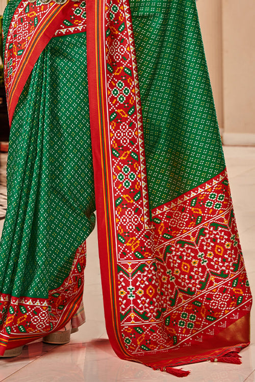 Load image into Gallery viewer, Denouement Dark Green Patola Silk Saree with Moiety Blouse Piece
