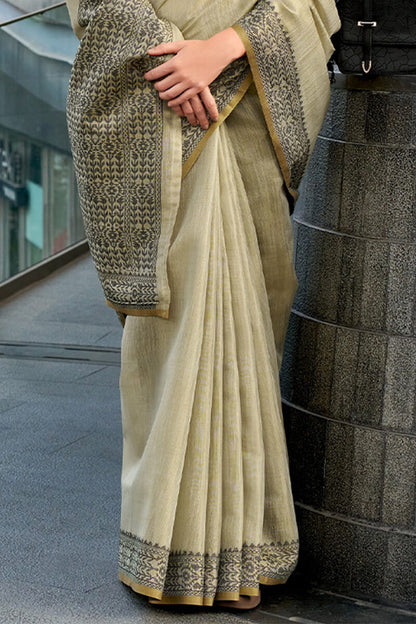 Prominent Beige Cotton Silk Saree With Twirling Blouse Piece