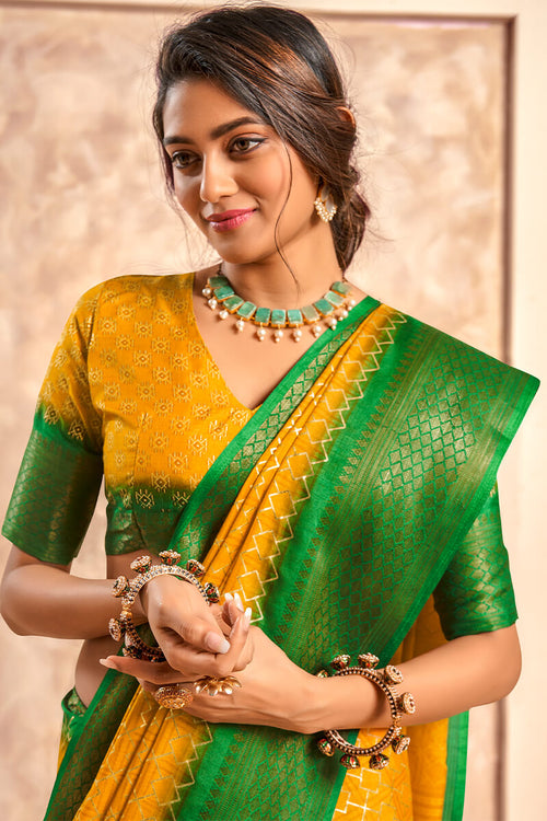 Load image into Gallery viewer, Ephemeral Yellow Foil Printed Dola Silk Saree With Inimitable Blouse Piece
