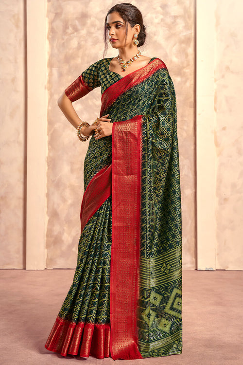 Load image into Gallery viewer, Enigmatic Dark Green Foil Printed Dola Silk Saree With Incomparable Blouse Piece
