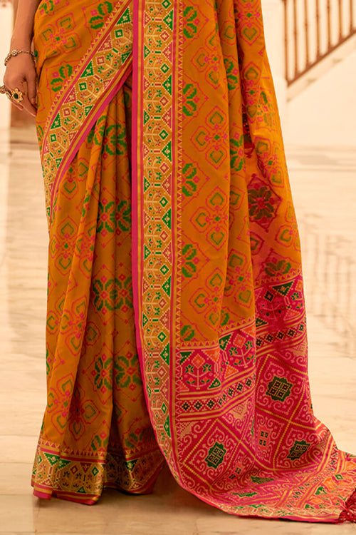 Load image into Gallery viewer, Dissemble Mustard Patola Silk Saree with Angelic Blouse Piece
