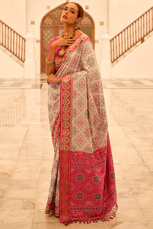 Load image into Gallery viewer, Flameboyant Beige Patola Silk Saree with Captivating Blouse Piece
