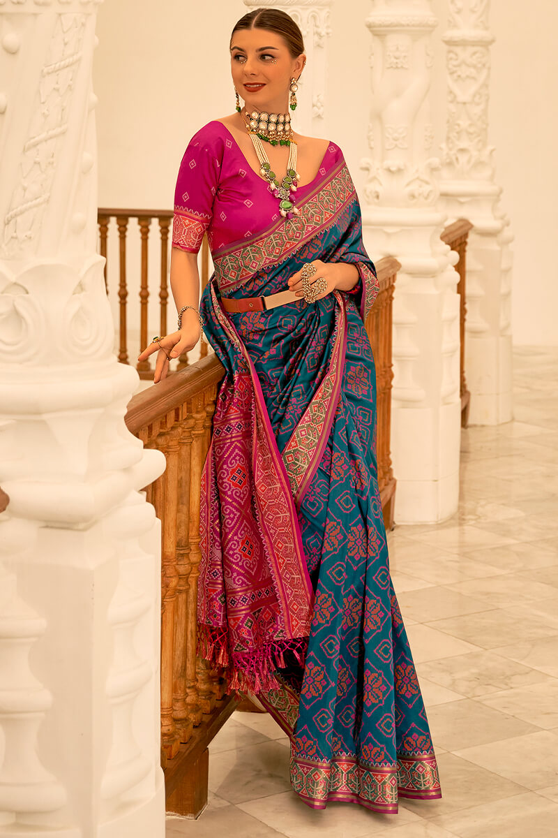 Intricate Navy Blue Patola Silk Saree with Adorning Blouse Piece