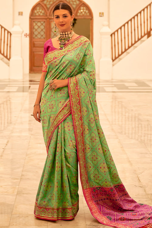 Load image into Gallery viewer, Deserving Pista Patola Silk Saree with Surpassing Blouse Piece
