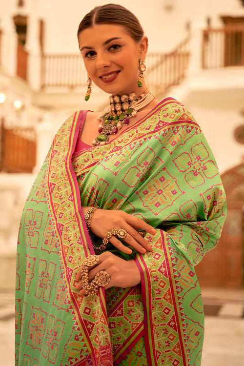 Load image into Gallery viewer, Deserving Pista Patola Silk Saree with Surpassing Blouse Piece
