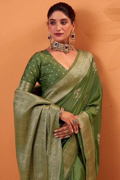 Capricious Dark Green Banarasi Tussar Silk Saree With Engrossing Blouse Piece